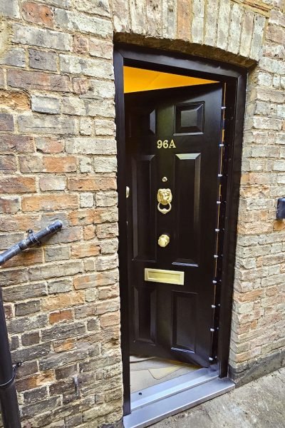 Security door with multipoint lock and heavy duty hinge bolts.