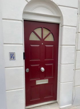 Red security door RC3 security rating.